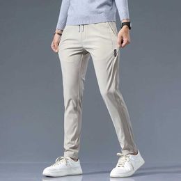 Men's Pants Elastic casual pants for men classic lightweight slim fit mens tight pants summer straight pull jogger solid khaki pants for men J240328