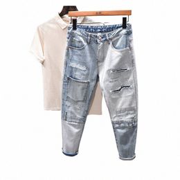 streetwear Designer Men Ripped Jeans Persality Patchwork Pocket Korean Ripped Hole Stitching Denim Trousers Male Hip Hop B6G1#