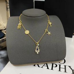 Necklaces New Ocean Fish Star Tassel Necklace Multi Pendant Design Dolphin Necklaces Summer Beach Party Women Jewellery Zk35