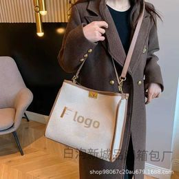 Designer bag 2024 Handbags Fashion Trend Big Handheld Single Shoulder Oblique Straddle Womens Bucket Red Book Texture Western Style