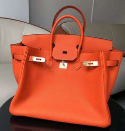 Women totes classic organic handbags small zipper pocket inner soft togo leather high economic versatile cross body bags 558