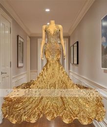 Gold Crystal Diamond Long Dresses 2024 för svarta flickor Sparkly Mermaid Style Champagne Sequin Prom Bowns With Train