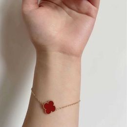 Original by designer Van Four-leaf clover Bracelet Medium Girls Luxury Small Group 18K Rose Golden Year Red Agate Fritillaria Jewellery