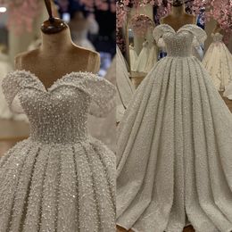 Pearls Ball Gown Wedding Dress Off Shoulder Beading Sequins Lace Wedding Dresses Bridal Gowns Robe De Mariee Ruffles Dubai Arabic Bride Dress