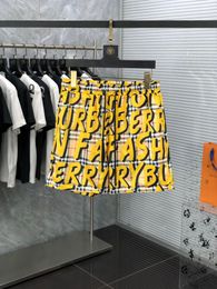 Men's Swimwear European station men's beach pants full of printed letters graffiti casual pants hip-hop Chequered shorts thin g4y
