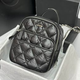 Borsa vintage imbottita in cotone da 23 cm Zaino di design da donna Reticolo di diamanti Hardware in argento Catena regolabile Borsa di lusso Borsa sotto le ascelle Portachiavi Borsa per vanità