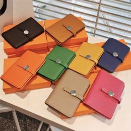 Wallets Guangzhou 2024 New Mid length Top Layer Cowhide Litchi Pattern Money Clip Circular Buckle Drawstring Wallet for Women