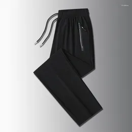 Men's Pants 2024 Minimalist Fashion Solid Colour Pocket Elastic Summer Ice Silk Thin Casual Versatile Drawstring Loose Crop