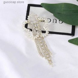 Pins Brooches Dmari Luxury Jewellery Rhinestone Long Thread Tassel Drop Brooches Korean Fashion Bow Tie Lapel Pin For Women Clothing Y240329