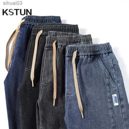 Men's Jeans Mens loose and loose jogging pants oversized pocket pants wide hind legs elastic waist brushed mens denim ponytail pantsL2403