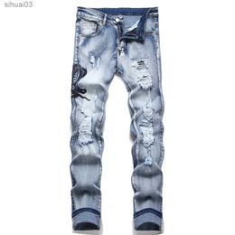 Men's Jeans Mens snake embroidered jeans with torn blue elastic denim pants ultra-thin tapered TrousersL2403