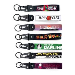 Keychains Lanyards The latest JDM style car keychain nylon slogan key label gift hanging rope key ring automatic key ring steel spring clip key belt Japanese anime gir