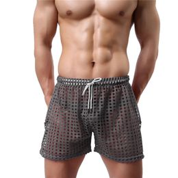 Sexy Mens Causal Shorts Big Mesh Breathable Gym Shorts Fishnet Boxers Transparent Loose Sleep Bottoms Men Hollow Out Swim Trunks240325