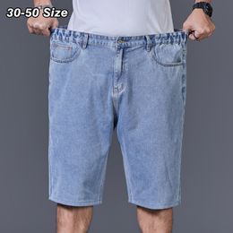Letnie męskie szorty dżinsowe plus rozmiar 44 46 48 50 jasnoniebieski klasyczny workowate proste krótkie dżinsy na kolanowe spodnie odzież