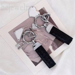 Lanyards Luxury designer keychain black leather key chain exquisite handmade car bag charms necktie contour metal grace fashion wallet key