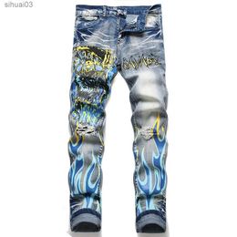 Men's Jeans Mens printed elastic denim jeans with fashionable flame Savage pattern extremely blue ultra-thin tapered Trousers with torn holesL2403