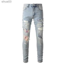 Men's Jeans Mens slotted patch elastic denim jeans with cracked hole patch work pants lightweight blue tight tapered TrousersL2403