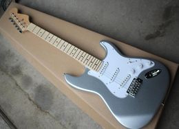 Electric guitar with big silver factory in pearl white and pickguard microphones channel region providing Customised services1782559