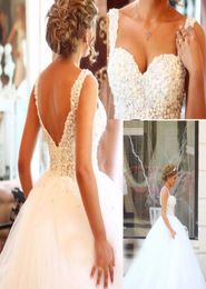 African Wedding Gowns Sexy Deep VNeck Corset Ball Gown Bridal Gowns Cheap Cap Sleeve White vestidos de noiva2044609