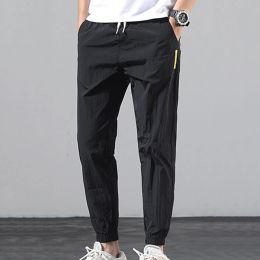 Mens Pants Summer Casual Trousers Feet Tracksuit With Tied Fashionable Men's Size Plus Loose Men's Long pants Cheap wholesale