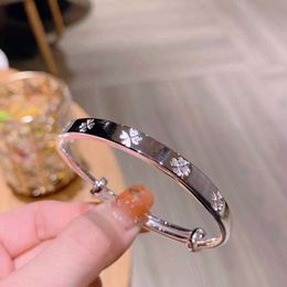 Vans Four leaf clover silver bracelet female pure silver 9999 young solid foot silver bracelet Jewellery niche girl gift