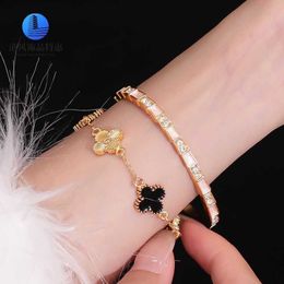 Vans Hong Kong counter 18K black gold four leaf clover bracelet for women light luxury and niche high-end design simple and sparkling diamond gold