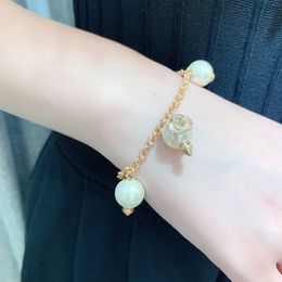 Armband Designer Pearl Fringe G Crystal Armband gjorda av forntida guldmetall, utsökta armband med runda vävstygn utsökta klassiska smycken!