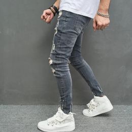 Neue Männer stilvolle zerrissene dünne Bleistiftjeanshose Streetwear männliche Hüfthop -Löcher dehnen schlanke Jeanshosen