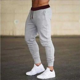 Men's Pants Mens fitness jogging pants ultra-thin sports pants cotton track pants suitable for joggers S-3XL sports pantsL24056