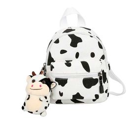 Plush Backpacks Mini canvas day bag with plush pendant and cow print backpack suitable for women girls outdoor travel and shoppingL2405