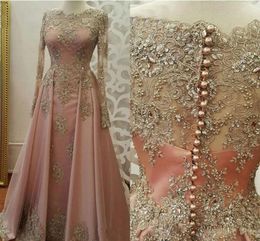 2021 Blush Pink Prom Dresses for Women Wear Jewel Neck Long Sleeves Gold Lace Appliques Crystal Beaded Sexy Formal Evening Party G3940353