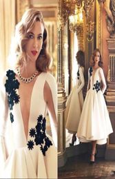 2018 Elegant Deep V Neck Prom Dresses Sheer Long Sleeves Satin A Line Lace Applique Formal Tea Length Party Short Evening Gowns2591139