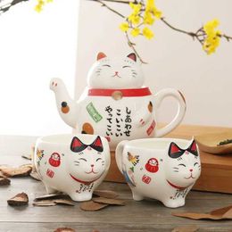 Conjuntos de chá criativos Creative fofo gato de gato porcelana Conjunto de chá de desenho animado TEPO CEPA CEPA COM PONTENDOR DE PLUTUS PLUTUS TEAPOT TEAPOT TEAWARELES