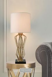 Postmodern living room golden decorative table lamp Nordic originality simple personality diningroom study bedroom2497831