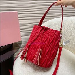 denim designer bag miuimiui Instagram trendy crossbody bag Western pleated soft underarm bag water bucket bag tassel shoulder crossbody bag women