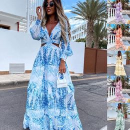 European and American fashion women's spring new elegant and flowy long printed V-neck long-sleeved temperament dress AST8465