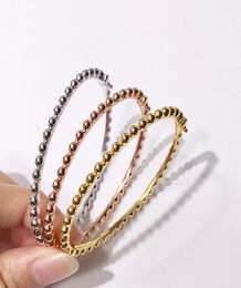 sell Fashion Accessories Copper Gold Plated Jewelry Buckle Narrow Edition clovr beads bracelet man and woman Bracelet Tricolor6727033