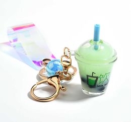Cute Mini Bottle Keychain Diy Milk Tea Keyring Moving Liquid Bag Charm Jewellery Accessories Women Luxury Cool Gift Whole G10198271086