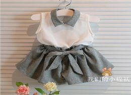 11502 New Summer Girls Sets Baby Kids Twopiece Clothing Suit Chiffon White Tops Vest With Bowknot Shorts Girl 2pcs Set Children O3143211