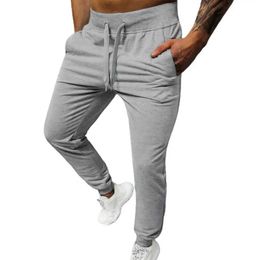 Men's Pants Simple solid Colour ankle strap mens pants with warm elastic waist support pocket and oversized pants for autumn street wearL24056