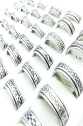 Whole 100pcsLot Fashion Stainless Steel Spin Band Rings Black Etched Mixed Patterns Jewelry Mens Womens Rotatable Party Ring 6700668