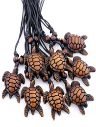 Fashion Whole 12PCSLOT Imitation Bone Carving Hawaiian Surfing Sea Turtles Pendant Necklace Lucky Gift MN4746370118