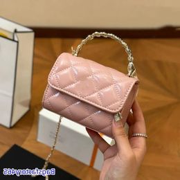 LOULS VUTT 13CM Woc Pearl Handle Mini Bag Makeup Bag Designer Womens Shoulder Bags Oil Wax Leather Diamond Gold Hardware Metal C Buckle Mbwi