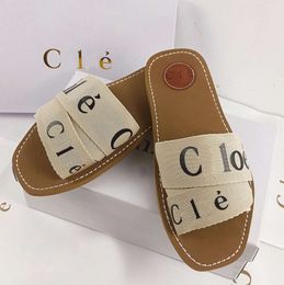 Designer Slippers Woody Sandals fabric Canvas Letters Luxury Brand slides flat sandals Comfortable trendy Fashionable open toed outdoor home sand Slipper 1125ess