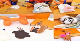 Unisex Plush Ball Animal Keychain Wallet Keyring Designer Cartoon Car Penguin Letter Fox Keychains Women handbag Pendant Accessori1125782