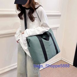 Shops Sell Design Travel Bags 2024 Korean Version of Instagram New Bag for Men and Women Large Capacity Shoulder Minimalist Luggage Sports Fitness