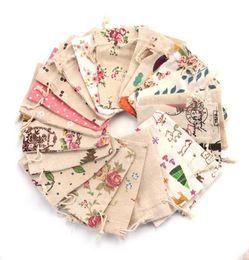 100pcslot Multi Designs Cotton Bags 10x14cm Linen Drawstring Gift Bag Muslin Cosmetics Gifts Jewellery Packaging Bags Pouches8028399