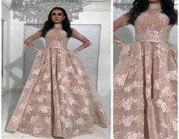 2017 Sexy Ball Gown Prom Dresses High Neck Long Sleeves Appliqued Nude Evening Gowns with Fixed Overskirt and Belts Sheer Pageant 3281179