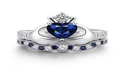 OMHXZJ Whole Solitaire Rings European Fashion Woman Man Party Wedding Gift Crown White Blue Zircon 18KT White Gold Ring RR6014749784