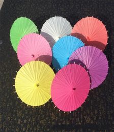 DHL 20304060cm Chinese Japanesepaper Parasol Paper Umbrella For Wedding Bridesmaids Party Favours Summer Sun Shade Kid Size5375771